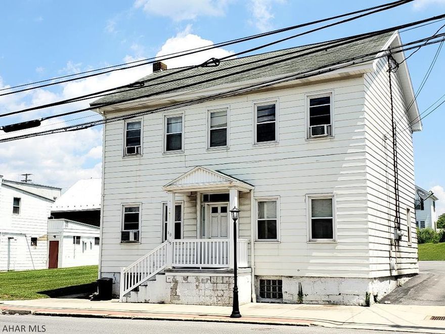 Great investment opportunity. Duplex with separate water, sewer & electric. 2 bedrooms in each unit. Updated tub surrounds by Bathfitter. Newer windows. Currently 30-day lease. T. 1st level unit has laundry hookup in basement. 2nd level unit has washer hookup in kitchen & dryer in one bedroom. Blacktop drive and parking in back. Great Opportunity to live in or use main floor & produce income from 2nd floor (1st floor tenant that moved was paying $425/mo). Tenants have been there over a year. Zoned Town Center District according to Borough - Buyer to verify zoning, sq ft, taxes & lot size.J-487