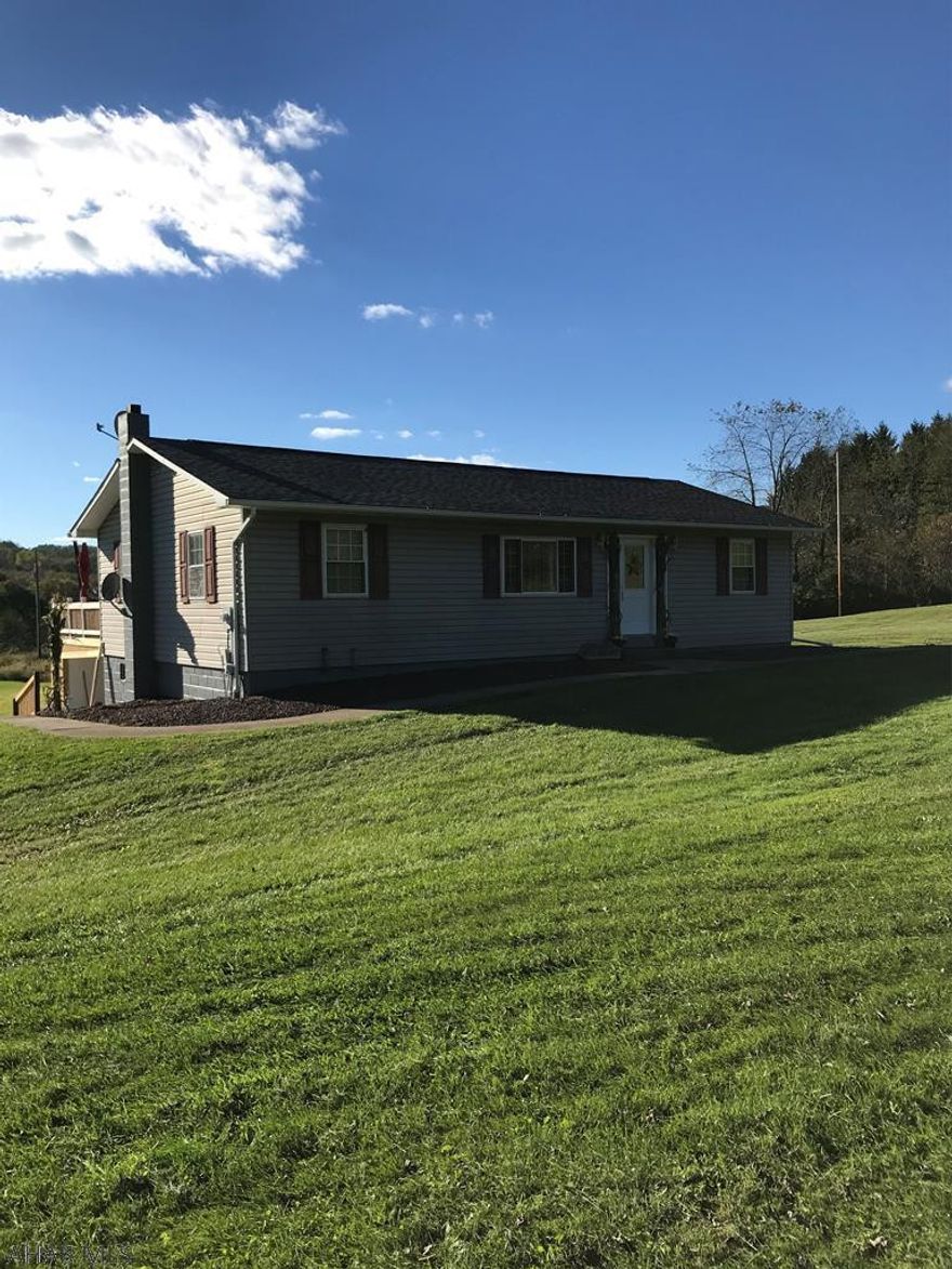 Beautiful country rancher on 2.78 acres of lawn. Home has three bedrooms with full bath with jet tub off the master bedroom. Living room and dining area. Oak kitchen with pass through. Basement has a large finished family room, den or office and laundry room. Partial paved drive and large pole garage with concrete floor, furnace and half bath. Well maintained home in good condition.