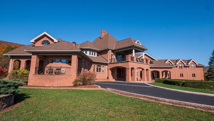 STUNNING BRICK MANSION on 257 private acres and adjacent to 1000 acres of state game lands! Secure, gated entrance; tree-lined, paved driveway that winds throughout the property and exits at the 2nd gated entrance along Scotch Valley Road; 2+ ponds: a grand porte-cochere; a 6-car attached garage; a 4-bay garage w/apartment above it; a detached 2-car garage; 5 bedrooms; 9 bathrooms; 5 gas fireplaces; indoor and outdoor fountains; sky-high ceilings; ornate windows; custom honey-maple kitchen cabinetry; a butler's pantry; 2 wet bars; a theater room; an exercise room; incredible interior and exterior lighting; a chandelier that lowers with a push of a button for cleaning; geothermal heat; central vac; multiple porches; and million-dollar views from every direction.