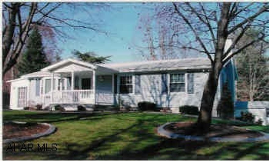 Totally remodeled new addition of sun room/dining room, new carpet, new vinyl flooring, professionally landscaped.