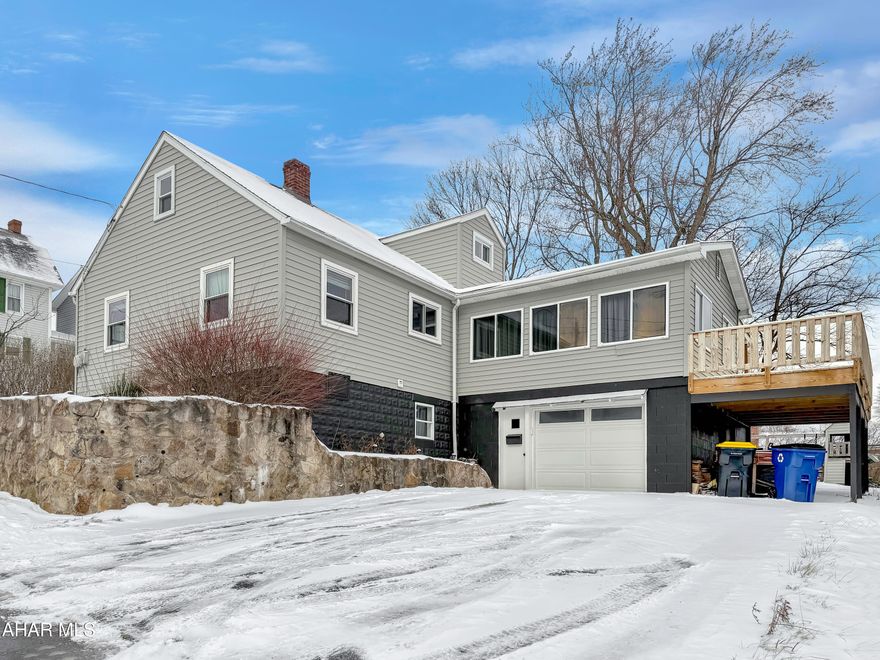 Welcome to 609 E Ogle Street in the Ebensburg Borough! This beautifully maintained home has been lovingly cared for & showcases thoughtful updates throughout. The main level offers a bright & spacious living room filled with natural light, a formal dining room, an updated kitchen with included appliances, & a large family room featuring a gas fireplace & direct access to the rear deck. You'll also find a full updated bathroom & two generously sized bedrooms on the first floor. The second level includes two additional bedrooms highlighted by custom, hand-crafted wood built-in beds, drawers, & storage, adding both charm & functionality. The unfinished basement provides a laundry area with ample cabinetry, a ¾ bath, abundant storage, & an integral one-car garage. Outside, enjoy off-street parking, a spacious yard, & a large rear deck ideal for relaxing or hosting guests. Call today to schedule your private showing!