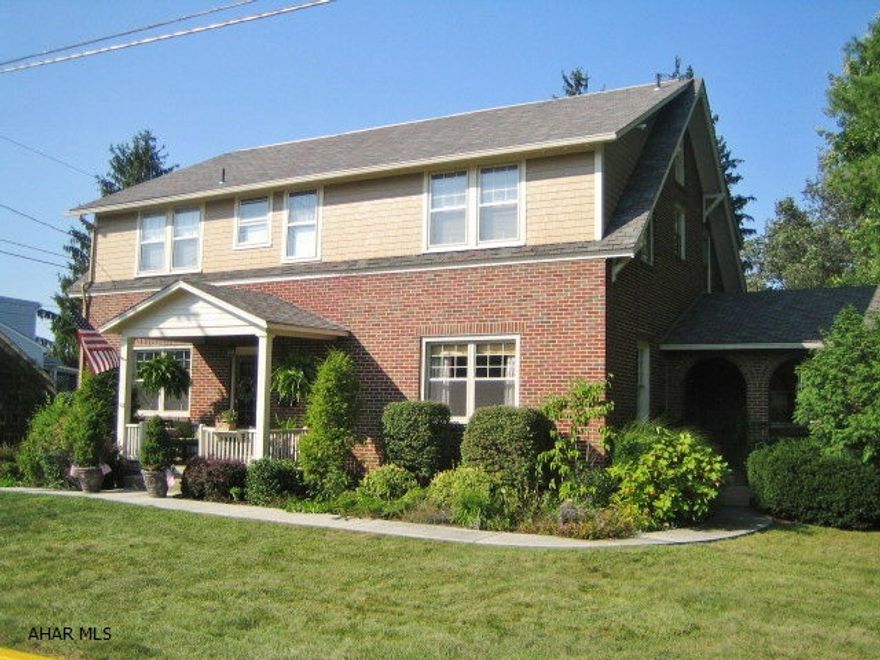 HOLLIDAYSBURG BRICK with room for every one! Walk to schools and town. Boasts 6 bedrooms, 4 baths, huge master suite with 2 sunrooms and screened porch. Beautiful, spacious rear patio and fenced yard, screened porch, garden shed and 2 car garage. First floor laundry and spare kitchen, plus semi-finished basement w/ rec room and bar. Low utility bills. 1 year home warranty provided.