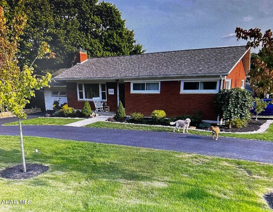 Fantastic updated one story home with recently added primary bedroom suite.   There is an additional ensuite bedroom on this floor as well.  4th bedroom has been converted to laundry room but is very easily converted back.  Features include hardwood floors, wood burning fireplace, 10 X 14 three season sun room, kitchen with granite counter tops, and breakfast bar.   The finished basement has an estimated 1200 sq ft of additional living space and features a large family room with gas fireplace and half bath.  Entertain outdoors on the spacious, newer composite deck.   Circular driveway for easy in and out plus additional parking in the rear.   This house is so comfortable you won't want to leave!!