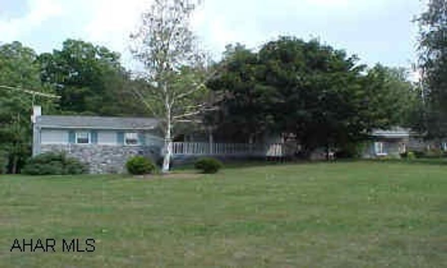 Gorgeous country ranch resting on 4.19 acres. This home offers a large family room with cathedral ceilings and gas fireplace, formal dining room with built-ins, large eat-in kitchen with custom oak cabinets and breakfast bar, first level laundry, three bedrooms, fully finished basement with fireplace, wet bar and bath, sun porch, multiple baths, stone patio, gazebo and hot tub. Relax and enjoy the harmonious blend of wildlife at this home.