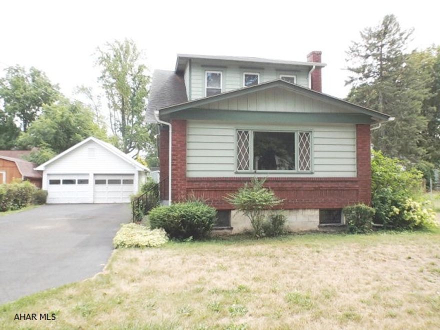 Great location, Nice sized lot. Home is dated and needs TLC, possibilities abound. Hardwood floors thruout most of home, Newer windows on 2nd floor. Screened in back porch. House roof approx. 12 yrs, Garage roof approx. 15 yrs old. Electric is 100 amps-`2nd floor knob & tube.Property is being sold as is and sellers will not make any repairs.