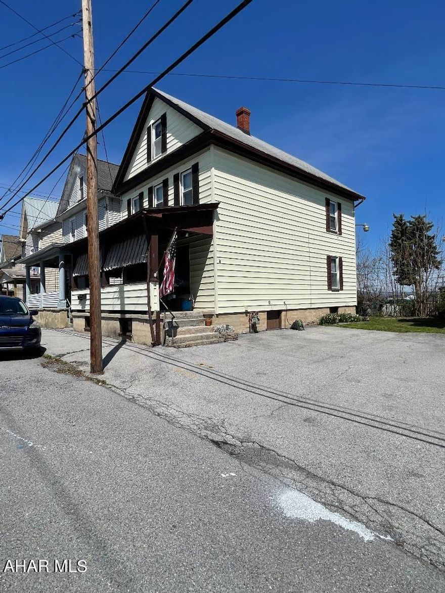 3 Bedroom 1 Bath with off street parking. Walk up attic great for storage.