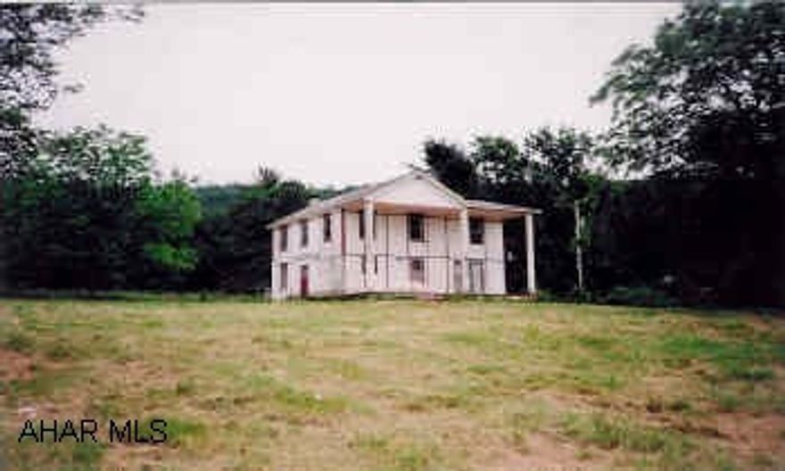 Secluded farm w/115 acres, 4BR/2BA house, needs rehabbed, bank barn, great view just minutes from Breezewood. 38'x50' bank barn, 2 small streams, view, 50% wooded 50% fields.