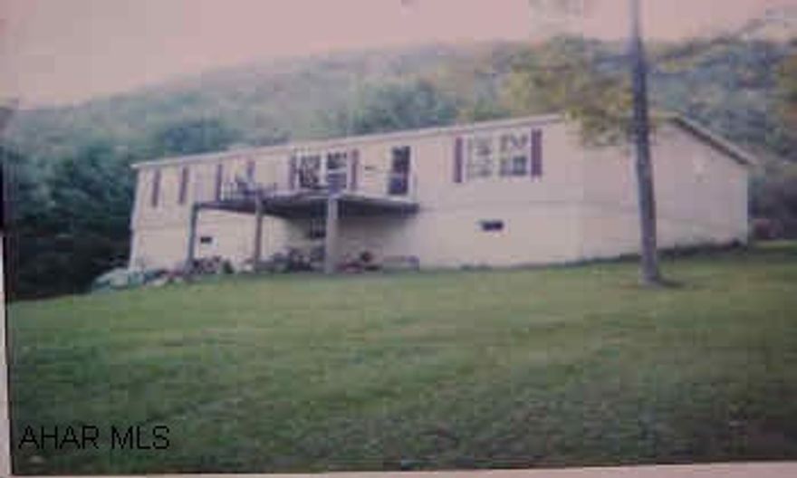 Beautiful immaculate doublewide on 10 very secluded acres trout stream and is adjacent to state game lands