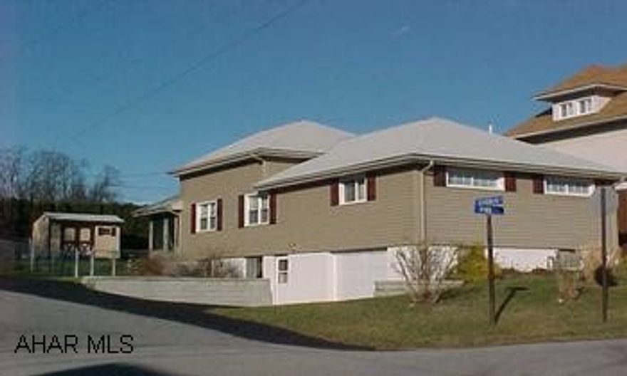 Attractive 1.5 story home on corner lot in popular neighborhood. New vinyl siding, new kitchen and windows. 3 bedrooms, 2.5 baths, new 3 season porch. Integral garage. New carpeting in Family Room and stairway. Call Ginny Erb.