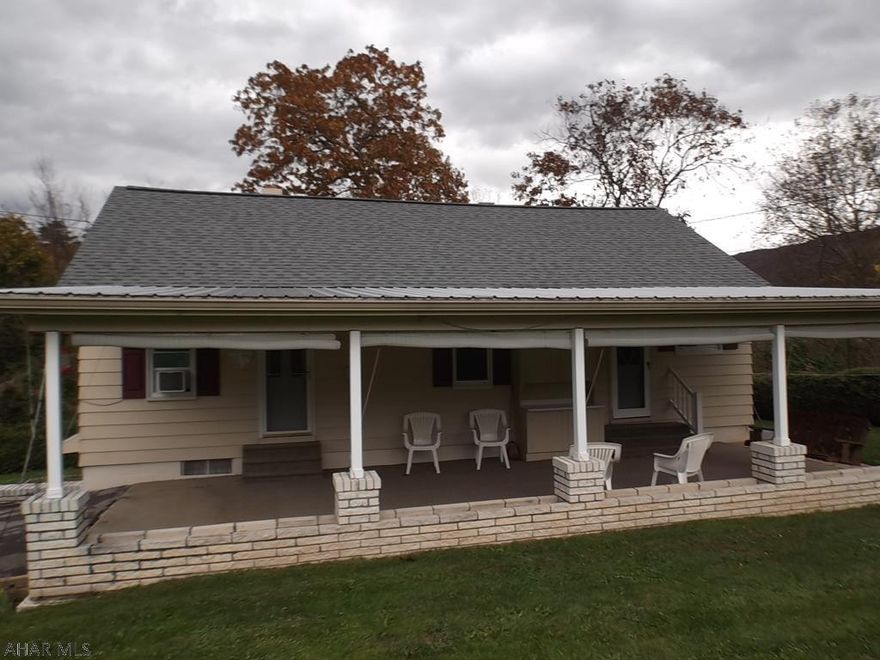 NEW PRICE...if you're tired of the NOISY city living, here's a great home to raise a family IN THE COUNTRY!.This home has been WELL maintained w/ 3 BR, 1 BA.  Kitchen is spacious enough to put a small table, but there is a separate dining room as well for when the gang comes for dinner.   Spacious finished space in basement - could be family room, exercise room, kids play room, craft room.........your choice   There is a  (24 x 24) 2 car detached garage w large area above AND (12 x 20)  shed . Don't forget the HUGE carport - which current owners used as a covered deck - would be GREAT for entertaining under roof - put many picnic tables here and grill til your heart's content!!.  sits on 2.77 acres of ground - Hollidaysburg School District.