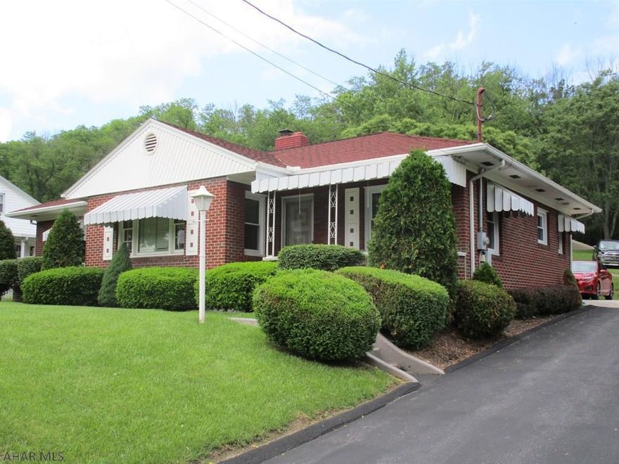 Well-built & well-maintained ranch home with brick & vinyl siding; almost all windows replaced in 2006+-; large family room w/ fireplace; formal living room; neat features such as a built-in milk delivery box, laundry chute, "retro" kitchen dining booth, walk-in cedar closet, closets with built-in shelving, 2 thermostatically-controlled eaves' exhaust fans; concrete garage apron, chain-link fencing, ...Looks are deceiving; this home is much bigger than you would think, 1,987+-SF of GLA on main level...