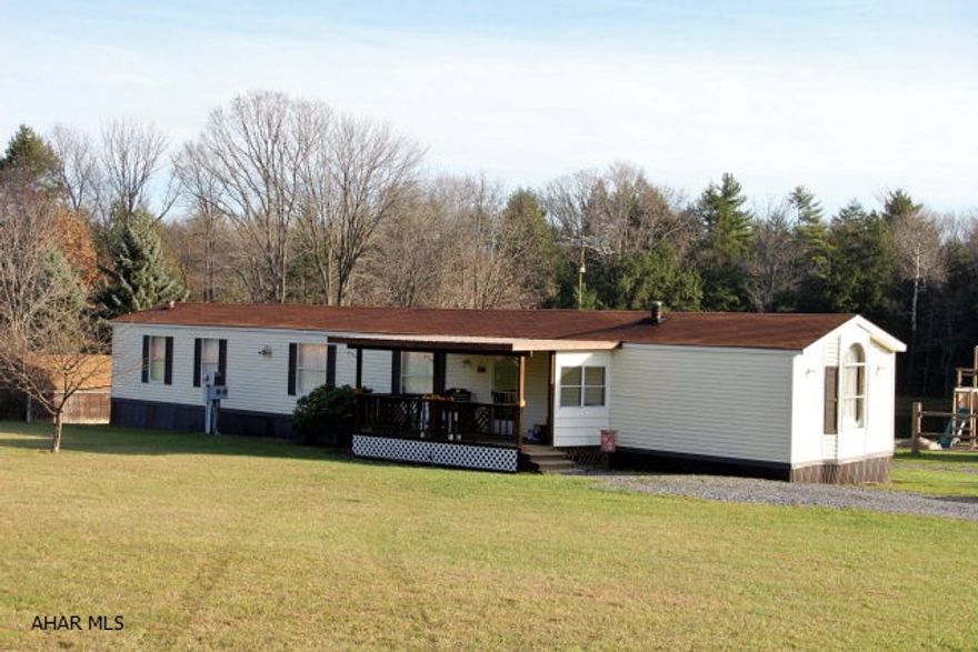 Attractive, well maintained mobile Home on 5 beautiful acres w/ pond. 2-3 BR's, 2 baths. Appliances included. Central air & shed