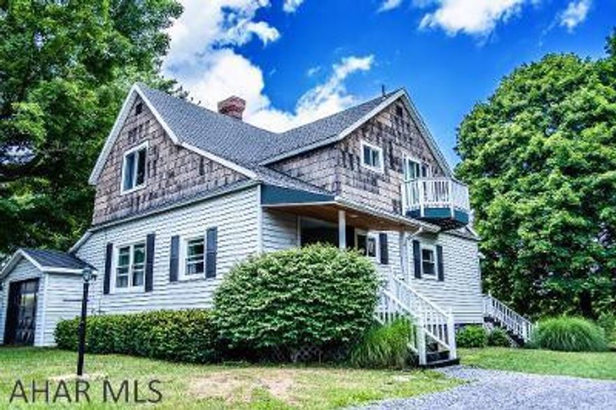 Enjoy, relax, unwind, listen to nature on the private back deck!  This spacious bright, airy home located in Central Cambria school district boasts charm, character, spacious rooms, good flow & privacy along with 3 bedrooms, 2 baths & master bedroom balcony & garage.  Contact Virginia for private tour 934-7684.  See virtual reality tour!