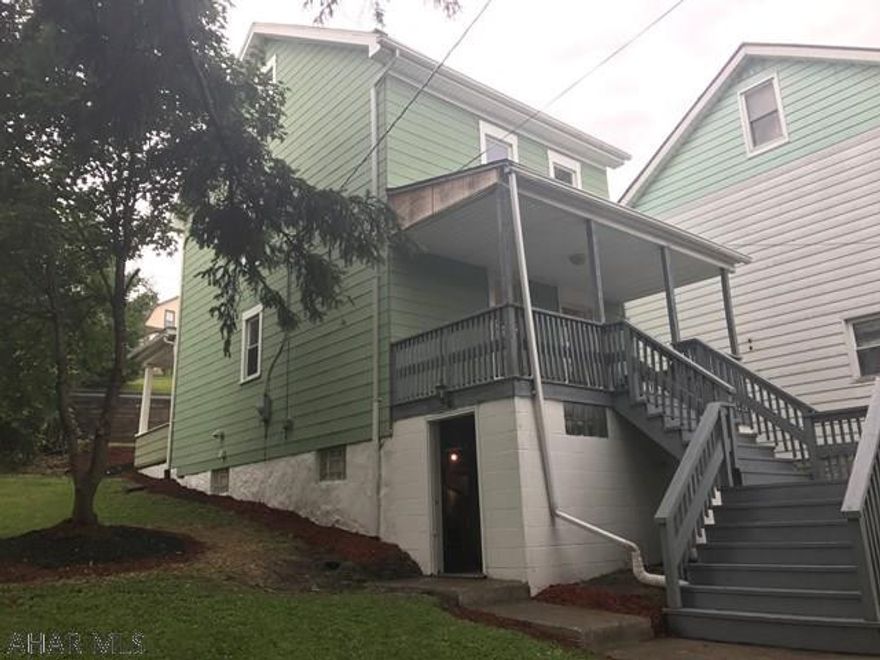 Home just reconditioned. Double lot, alley access only.  Nice lot with pine trees. Driveway at rear. Large deck overlooking Brush Mountain view.. Interior repainted. New furnace. 200 amp circuit breaker panel.  Lot has nice mulching. Finished 3rd floor could be bedroom.