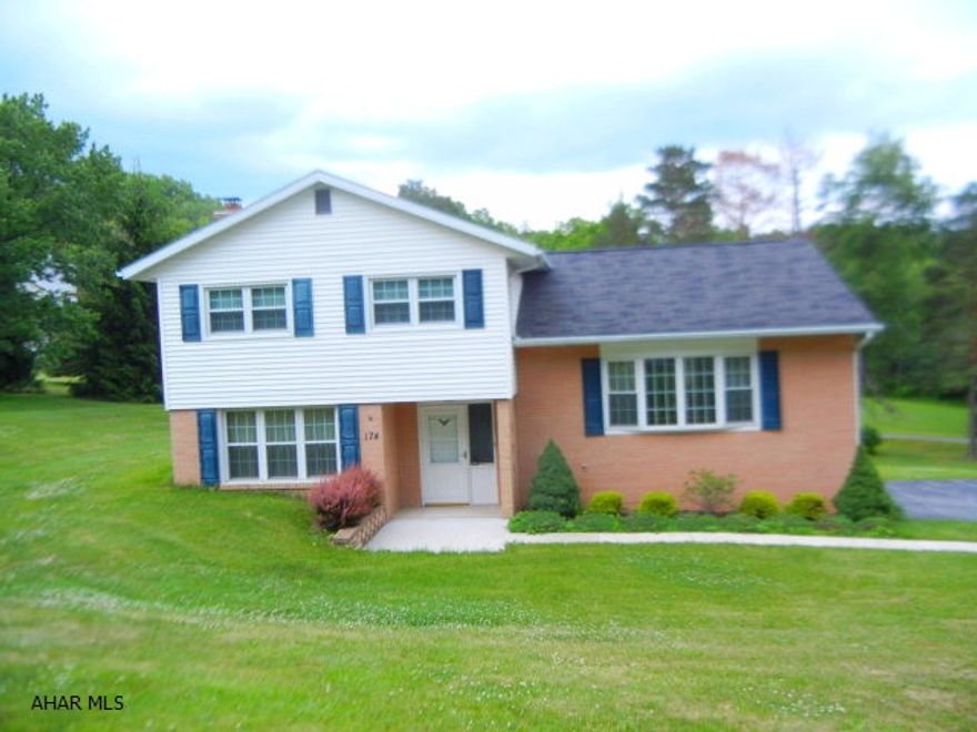 Location, Location, Location!!!!  This split level awaits new owner (one owner to date,,, very well maintained)  Offers 3 BR, 1 1/2 BA, very spacious family room with fireplace, large kitchen with breakfast bar and separate dining area to host holiday dinners! Have barbeques on the rear deck (glass sliding patio doors in dining room lead to deck)  This home sits on a large lot (.61 acre) Also has a one car garage.  Very nice  hardwood floors are hiding under carpets:) but are exposed in the one bedroom.