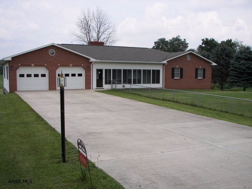 This freshly painted 4BR,2  bath home with its 1st Flr laundry rm,Master Suite w/ walk-in closet,4th BR that could be a den/office,large Living Rm with an inviting Wood Burning Fireplace with blower, & a nice sized Kitchen & Dining area is move in ready for the new home owner. A covered porch off the dining rm is inviting for family gatherings or to just relax & enjoy the view. The 25 x 22 two garage is conveniently located to carry the groceries from the car to the kitchen. An additional garage under the covered porch can be used to store the lawn furniture & lawn mower. The unfinished heated  basement has endless possibilities!The home has oil hot water baseboard heat & has 3 zones & central A/C.The front yard is partially fenced & there is also an underground invisible fenced area.