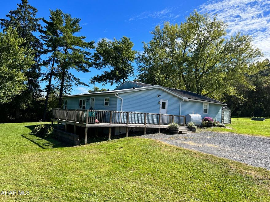 This 3 bedroom 2 bath home is not lacking in space. Come in and make it your own. Sit out on the spacious deck or around the stone fire pit. Nice private lot, close to 99.