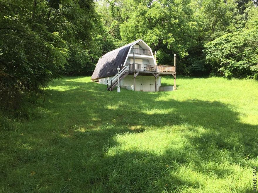 Your chance to own 14 beautiful acres of wooded property on Polecat Hollow Rd in Williamsburg.  Small hunting cabin with two car garage can be finished to your specifications.  Not far from award-winning trout streams.  Feels completely secluded, yet you can be in town within minutes.