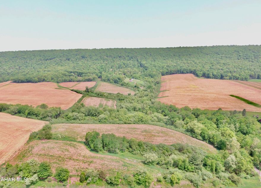 Hard to find property in South Central, PA offering 90+/- acres with a 3 bedroom - 1 bath cabin,  24'x40' pole building, camper, open and wooded ground, trails throughout, and so much more. The setting of this property provides excellent privacy to get away from the hustle and bustle of life and enjoy the outdoors with easy access to the PA Turnpike, I-70, & I-68.