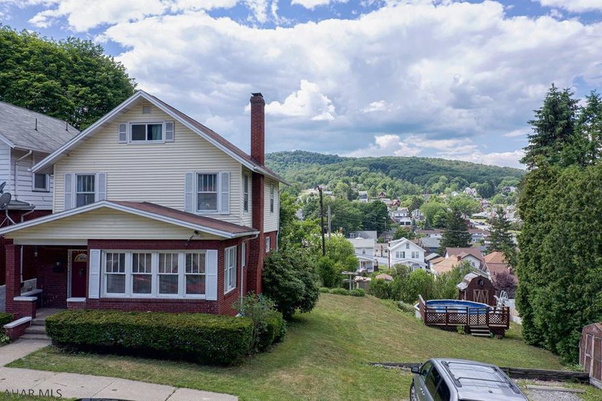 Lovely brick home located in Calvert Hills section of Altoona! Move right in to this spacious home with a freshly painted interior, brand new carpet in the bedrooms, new vinyl flooring and new shiplap ceiling in the hallway upstairs! The sunroom off the living room would be perfect for an office or den! The kitchen offers eat-in area with built-in benches. This home has an updated full bath, large walk-in closet that could also be used as a nursery. The finished attic was previously used as a 4th bedroom! The partially finished basement makes a great workout/gym area, and also has a 3/4 Bath. Beat the summer heat by cooling off in the above ground pool or covered private back porch that has just been freshly painted - also NEW outdoor carpet! Furnace and central air are approx. 3yrs old.