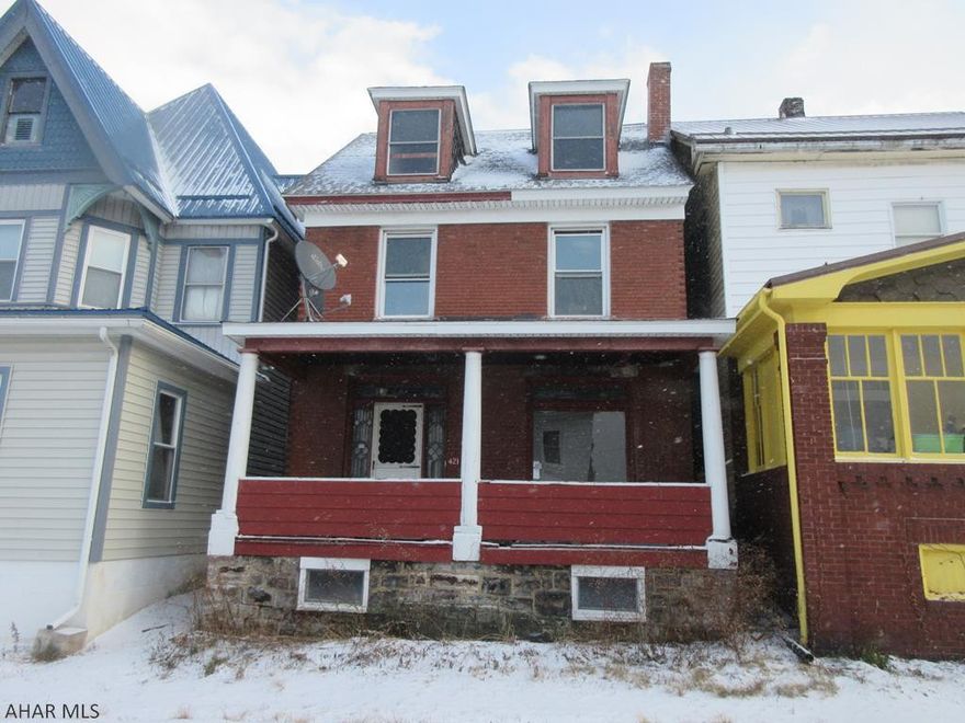 Altoona brick 2 story home in need of TLC. Living room and large eat-in kitchen with adjoining dining area (kitchen cupboard doors missing). Nice fenced yard with off-street parking. Property sold AS-IS. Seller will make no repairs.