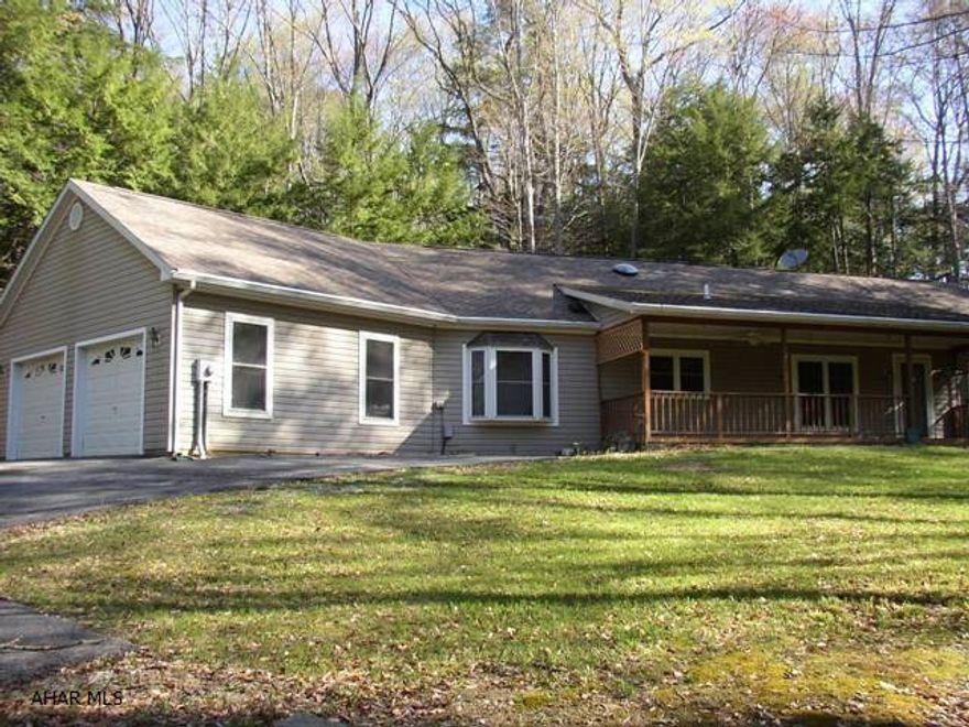 Custom built three bedroom with two bathrooms.  This original owner home features kitchen with center island, stainless steel appliances and lots of counters.  Master Bedroom suite features double sink, jacuzzi tub and walk-in closet.  Basement is superior.  Wall is solid concrete.