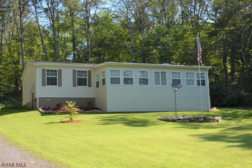 Very well maintained home with a private setting in the woods. This home offers 3 bedrooms, 2 full baths with many recent updates! The large enclosed porch would make for a great place to kickback and enjoy the peacefulness of the setting and nature. Seller is including the kitchen appliances and washer/dryer! Would make a great home for a first time home buyer or someone looking to downsize.