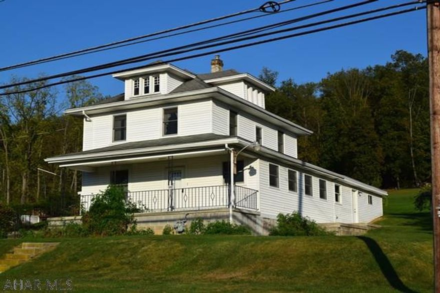 Spacious 4 bedroom 3 bath home with a two car attached garage and situated on over half an acre. Setting directly across from Claysburg Kimmel School with an additional 7.82 acres available behind the home. Large shed/workshop with electricity. Call listing agent today for more details.
