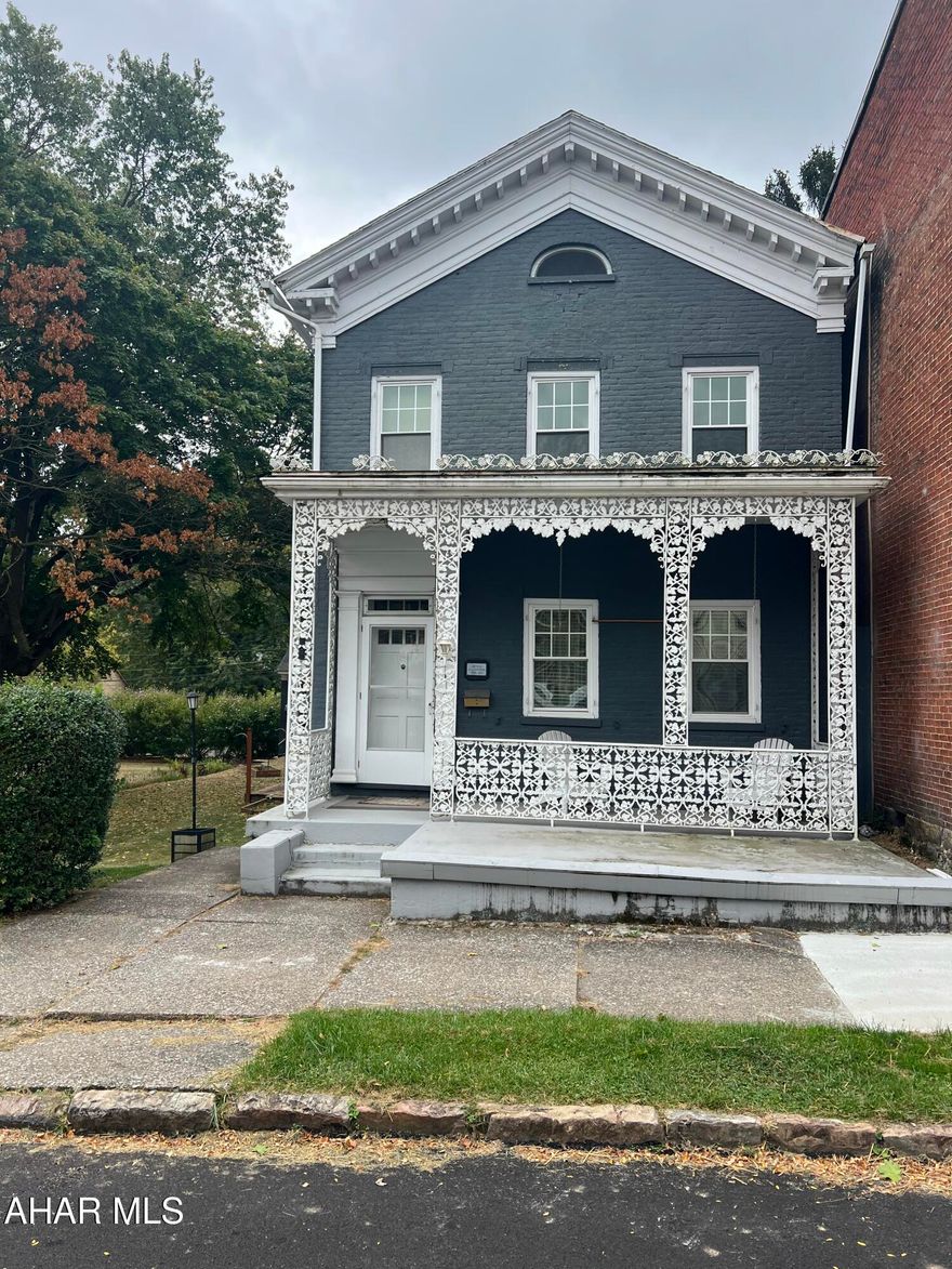 Don't miss your chance to own this rare find in the historic Hollidaysburg district! This two-story home offers 3 bedrooms with the option for a fourth, 2 full bathrooms, and four-seasons rooms on both levels for year-round living space. This residence blends architectural character with modern comfort. The unique sunken kitchen adds character you won't find anywhere else, while the spacious lawn, deck, and fire pit make entertaining a breeze. A large two-bay garage with soaring ceilings and a built-in workspace is perfect for hobbies, storage, or even a home business. This home is full of charm, comfort, and possibility in a sought-after location. Homes like this in Hollidaysburg don't stay on the market long—schedule your showing today before it's gone!