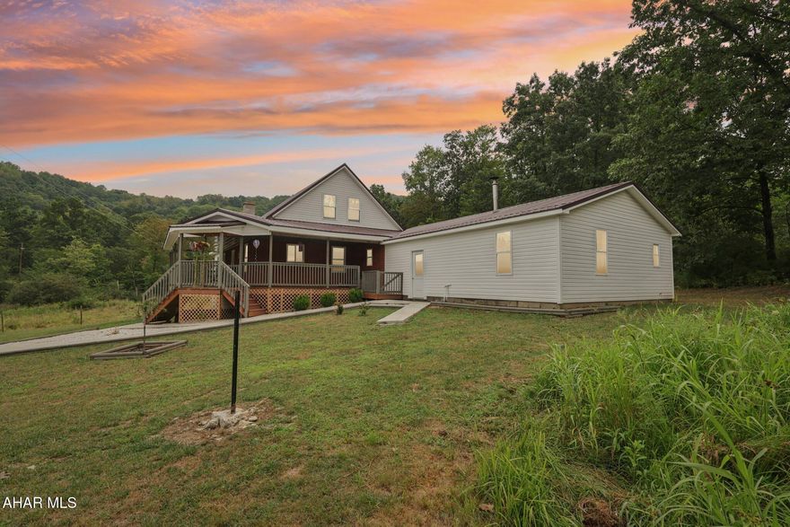 Let yourself become immersed in the tranquility of the surroundings as you relax in your favorite chair on the wraparound porch. This is such an amazing opportunity with a new home built in 2022, a 60'x40' pole barn with full-length lean-to, an additional outbuilding, and a respectable ratio of cleared vs wooded areas... all sitting on 35-acres just outside of Punxy and slightly north of Indiana. And if that's not enough, it also includes up to 300,000 cu.ft. of free gas usage per year. The home incorporates a wonderful open concept design with a large kitchen, walk-in pantry, adjoining dining area, a huge living room, and a spacious laundry/multi-purpose room. The large, walkout basement provides massive opportunities for additional useable space. The pole barn is configured with numerous stalls and could likely be modified into a large garage depending on the new owner's requirements. Electric is not installed but is available at the road.