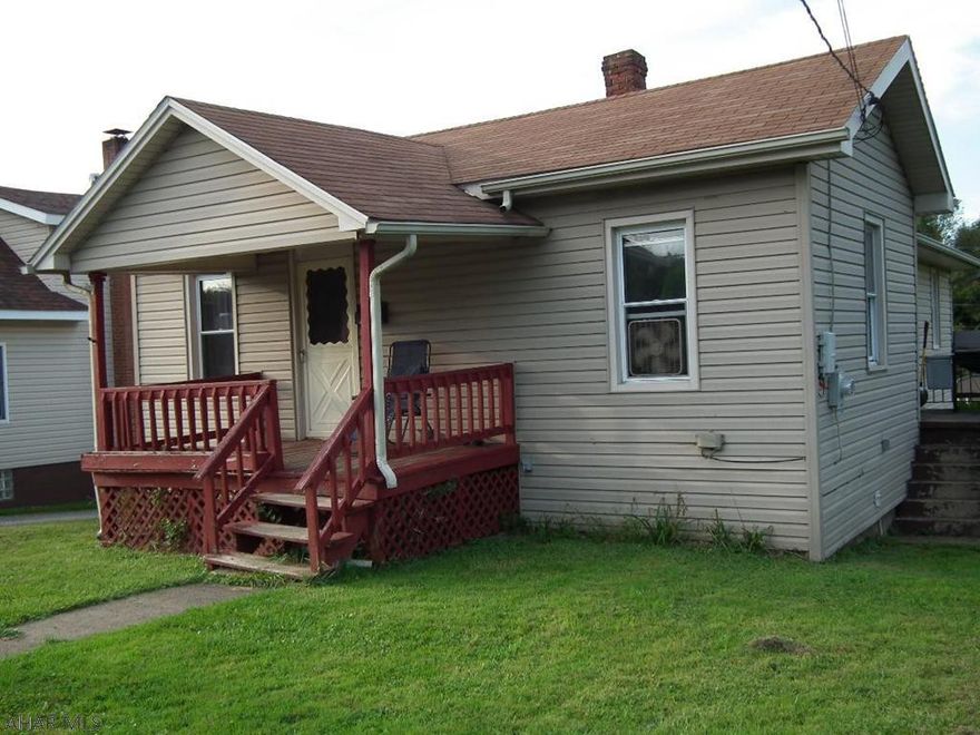 One Story Home in nice neighborhood.  Large living room - dining space off LR, modern kitchen, 3 bedrooms.  1st floor Bath & Bathroom in basement.  Can be purchased for start up home or rental.  Current tenant needs 30 day notice to vacate.  Large lot.  Driveway/garage could be added with permits - Garage was on property.