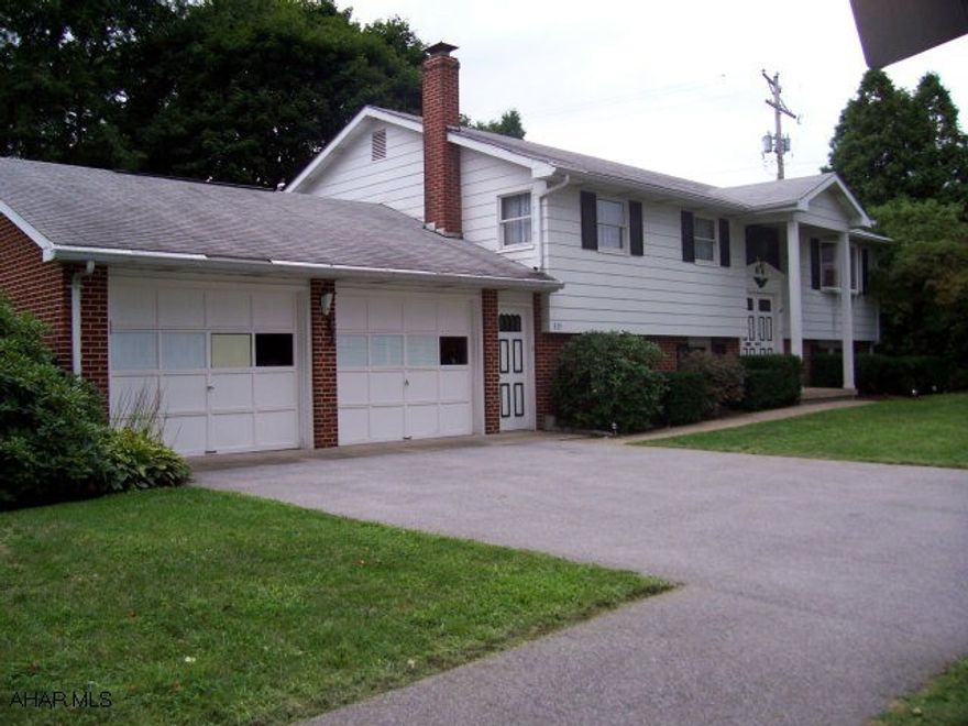 Great mother-in-law suite on lower level with separate entrance and zoned heat. Outside access from lower level into large mudroom.  Great corner lot, super-convenient location.  Separate family room with fireplace on lower level.FULL HOME WARRANTY INCLUDED.  Seller is willing to give a $2000 allowance for upgrades.