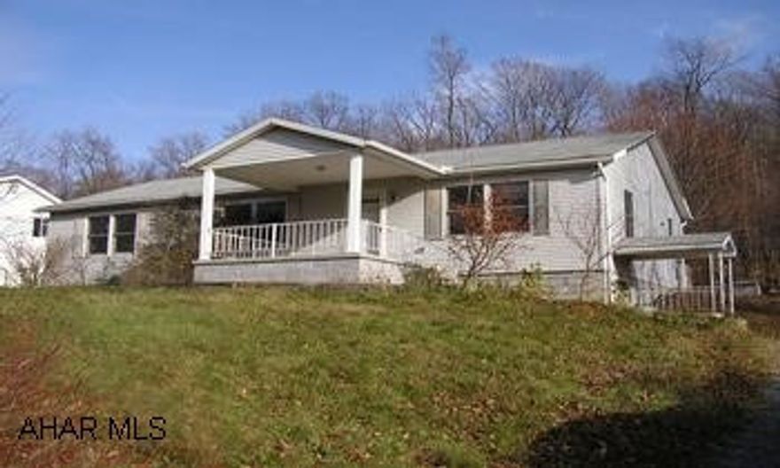 Sturdy 3BR/2BA vinyl ranch on large lot with country view. 3 bedroom ranch on large lot.  Full partially finished basement with workshop. Geothermal heating/cooling system. Great potential. Offered "As-Is"