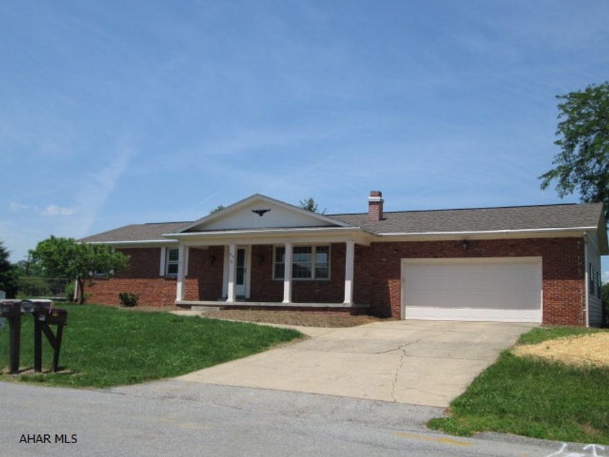 A GREAT OPPORTUNITY IN PENN FARMS! Gorgeous hardwood floors thru out this 3 bedroom, 1.5 bath home. Spacious living room with wood fireplace, 3 season room in back of home and very nice in-ground pool. Fenced area of yard is great for kids or pets and the oversized 2 car garage offers plenty of storage! Partially finished basement with family room and laundry room. A great buy at this low price!!