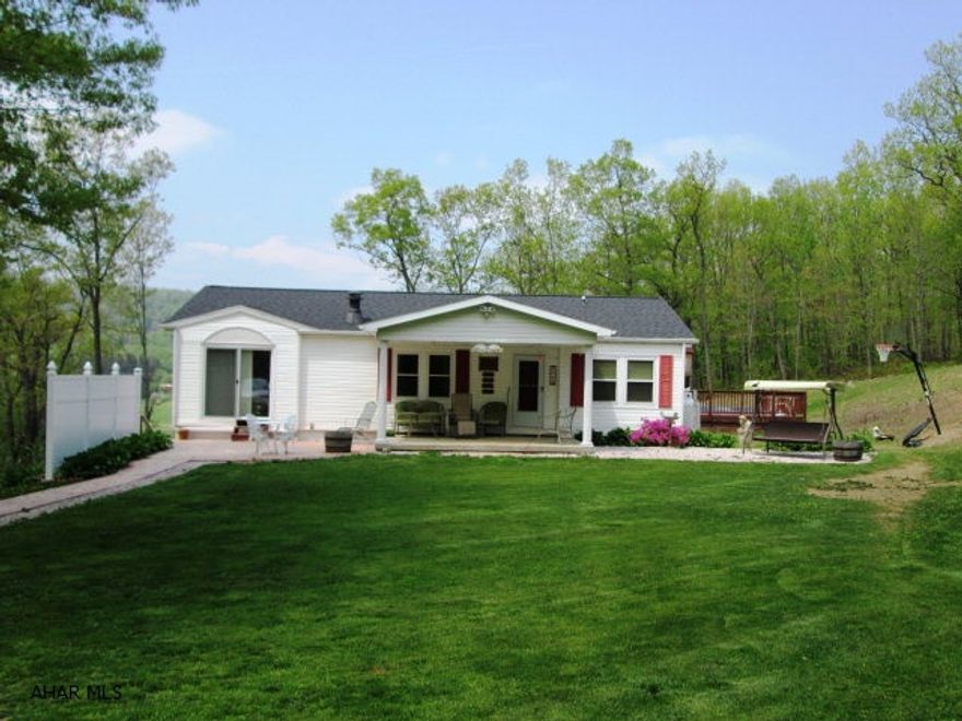 Hollidaysburg Schools/Foot of Ten Elementary. Secluded setting with all the amenities you desire. Master BR suite with full bath, large kitchen with nook, pool, hot tub and lower level theater room. All theater room equipment included plus the 86 GMC truck with plow.