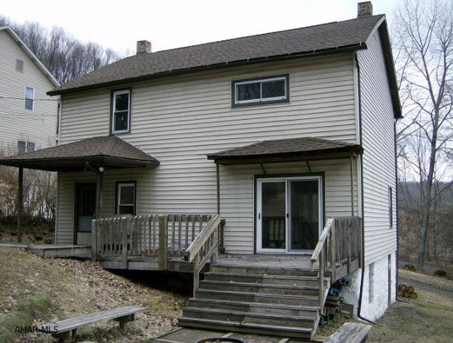 Jackson Twp- Central Cambria schools!,- 3 BR, 2 story vinyl sided home on a 60 x 140 lot. Oil HW baseboard heat. 2 car detached garage (30 x 40). Family room.