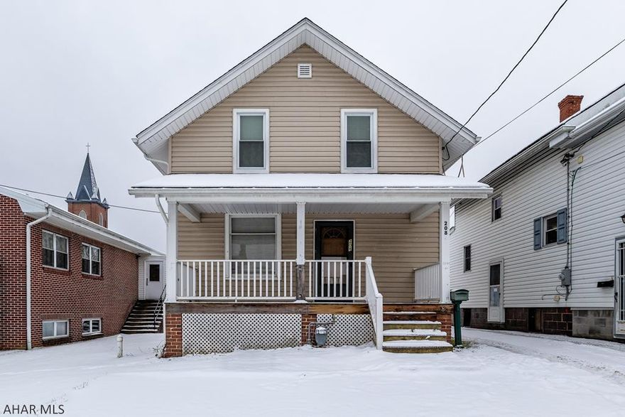 Newly carpeted 2 bedroom home, spacious living room, dining room.  5x8 concrete parking space.  Great starter home or rental.