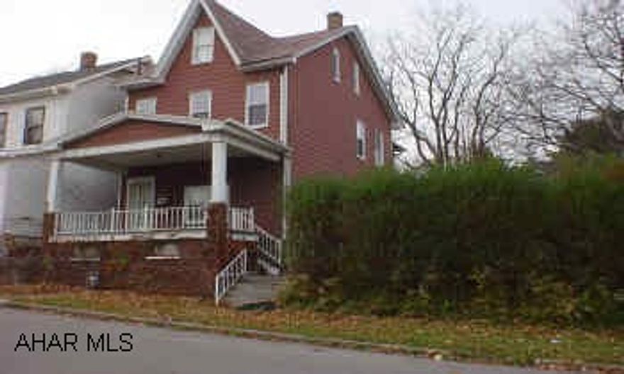 Nice duplex with newer roof, furnace and windows, 2 car detached garage with off street parking.