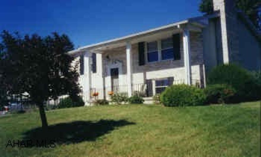 Lovely colonial split-entry, 3 bedrooms, 2 1/2 baths, all new carpet, new kitchen, central air, gas heat, newer furnace and roof, and fenced yard.  Very desirable location in Sylvan Hills.  New windows and doors, featuring French Doors located in the Dining Room and a fireplace in the Family Room.  Hollidaysburg Schools.   Realtor owned.