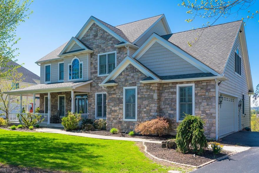 Fox Hollow.  Beautiful, well maintained 2 Story. 4-5 Bedrooms, 4 full baths...possible first floor bedroom or home office, adjacent full bath.  Spacious, columned foyer leads to a reading room, DR and family great room.  Open concept design...granite counter tops, breakfast bar and seating area.  2nd floor consists of the huge owner's suite with  tray ceilings, jetted tub and a generously sized walk-in closet.  Kid's rooms are all of ample size.  The laundry is centrally located on the 2nd floor and has a sky light!  Lower level walk out basement makes a nice guest retreat or a place for the kids to hang out...complete with a wet bar, dishwasher and another full bath.  Double doors lead to a patio.  Watch the deer from the deck.  Kids will love the tree house!!!  Great views, cul de sac.