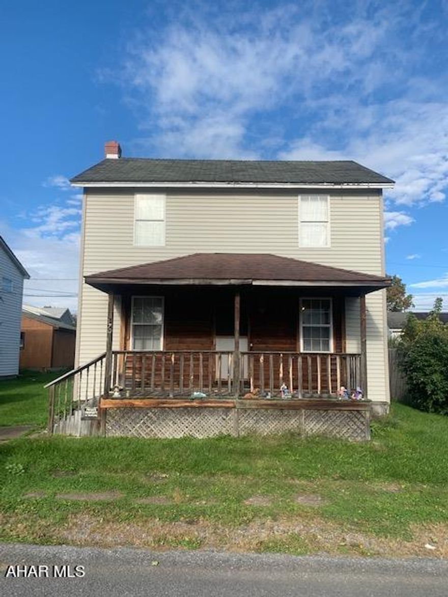 This two story, two bedroom, one bath home  is in the Chestnut Ridge School District. Make this home your own with a little TLC and some updating. Nice back yard, one car garage with a work bench. This could  be a nice investment property!