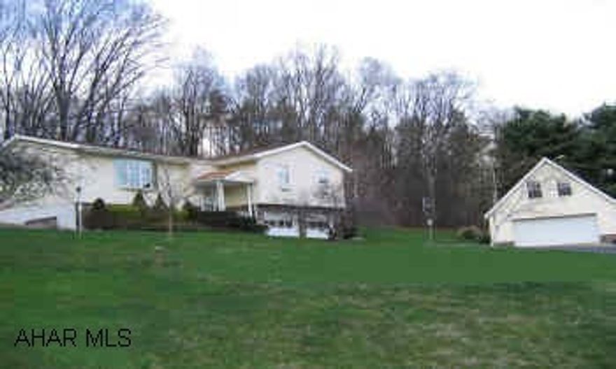 Lovely split entry with a nice view!! 3 bedrooms, 2 baths, living room with fireplace, hardwood floors, screened in patio, deck with hot tub, pond, 2 car garage plus separate 24x30 garage with 27x16 loft 5.5 acres, call today!! No showings until 5/31/05 Lovely split entry with a nice view!! 3 bedrooms, 2 baths, living room with fireplace, hardwood floors, screened in patio, deck with hot tub, pond, 2 car garage plus separate 24x30 garage with 27x16 loft 5.5 acres, call today!! No showings until 5/31/05