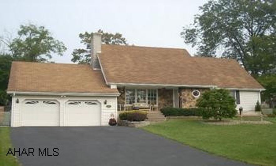 An Extremely Pleasing Home!  Immaculate condition with tons of upgrades & improvements. 2 bedrooms on the main floor(one currently used as an office). 1st floor laundry& bath. Large screened back porch, fenced yard and a  patio large enough for a basketball court. 2nd floor also has 2  bedrooms and a bath. Beautiful and tastefully finished family room on lower level with kitchenette & bath-just finished August 2007. Vaulted ceiling in living room with unique stone wall and formal dining room w/built in shelving.FInished 2 car garage w/attic storage with entrances to lower level and laundry room. Call Dianne 329-1856 to see this immaculate home.  Settlement contingency on property.