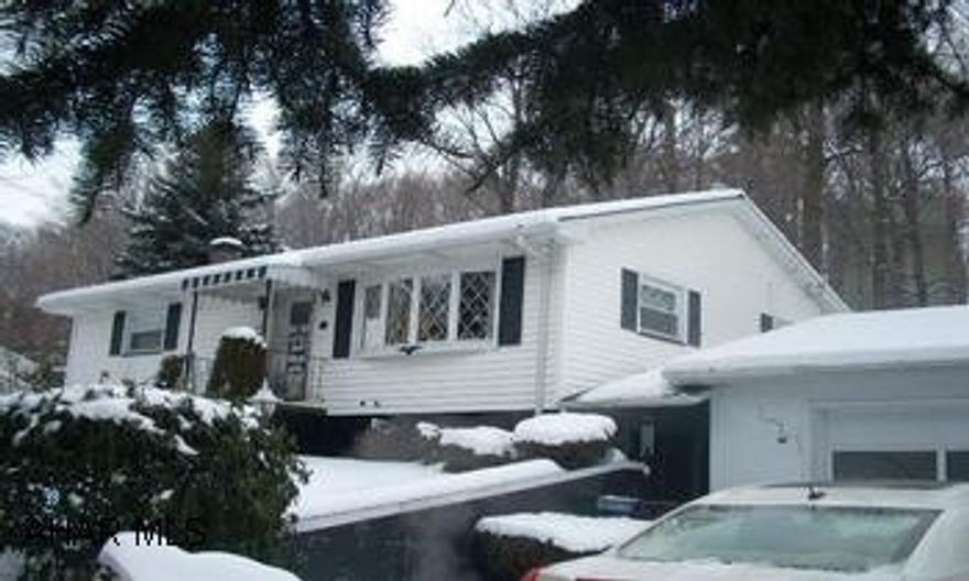 Ranch home, two bedrooms, 1.75 baths, Family room in basement, two car garage. Nice Rnch home in private location, new insulation and newer windows, Call John 329-2621.