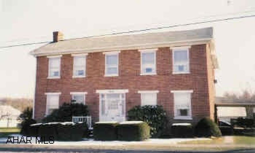 2-Story Brick home on 1/4 acre, w/large detached garage, 3-bedrooms, 3/4 basement, heated with oil hot water radiator.