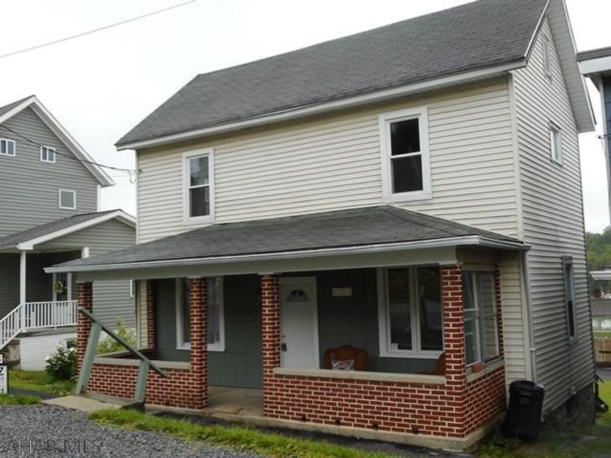 Beautifully remodeled two story vinyl sided home featuring three bedrooms, 1.5 baths, updated kitchen, new floor coverings, newer furnace and tanks. This well cared for home is waiting for you! Take a look - you won't be disappointed! There is a security system in the home. Buyer will need to renew service if desired.