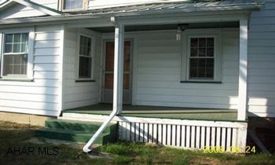Beautiful hardwood floors.  New full bath.  New metal roof.  A nice country home with a view.