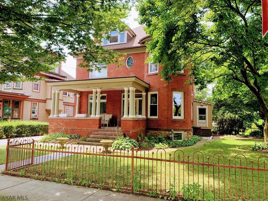 Motivated Seller! Great location. Must See!! Move right into this Beautiful Victorian style 5 bd 2 ba home w a turret that has been completely updated in 2015 with large beautiful custom eat in kitchen with island and ss appliances, large living room with fireplace, dining room with stained glass windows, custom 1st floor laundry room and bathroom w heated tile flooring, large rooms with hardwood floors and beautiful stained glass and lead glass windows through out, gas fireplace, Finished 3rd floor with vaulted ceiling that can be a 5th bedroom w loft, large screened in rear porch that walks down to a beautifully landscaped lot with  patios and walkways, great for entertaining.One car garage. All updated mechanics, furnace, plumbing, heating, electric, newer roof and windows
