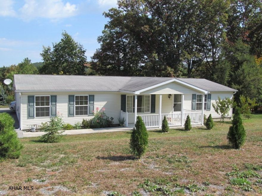 Immaculate & ready to move in to! This exceptionally maintained 1999 home features 3 BRs, 2 full baths, lge oak kitchen with center island, new water softener and UV system, new hot water tank, carport & shed.  Recent landscaping and new fruit trees including apple, cherry, plum, pear for your future enjoyment. Quiet neighborhood with a beautiful view.  Nice central location between Altoona & State College.