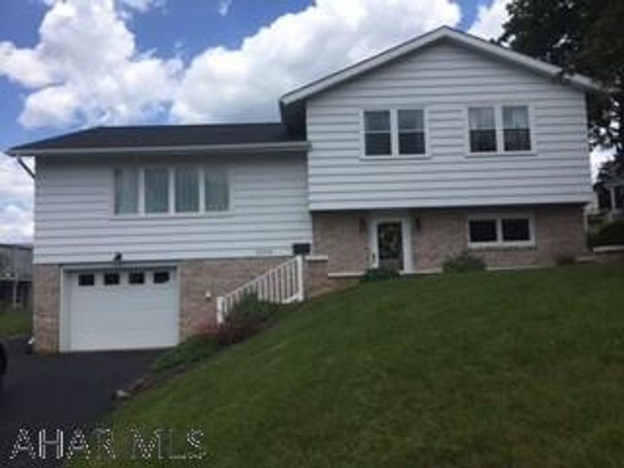 Pleasant Valley 3 bedroom multi level on 60 x 117 lot. Pristine condition with eat in kitchen and finished lower level with bar and half bath. Priced for action at $159,900